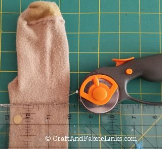 cut sock for DIY mastectomy prosthetic and bra